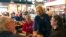Sen. Kirsten Gillibrand, D-N.Y. greets patrons at Stomping Grounds Cafe in Ames, Iowa, on Saturday, Jan. 19, 2019.