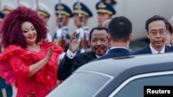 FILE - Cameroonian President Paul Biya, center, waves as he arrives at the Beijing Capital International Airport ahead of the 2024 Summit of the Forum on China-Africa Cooperation in Beijing on Sept. 4 2024. The summit was the last time Biya has been seen in public.