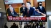 A TV screen shows footage of impeached South Korean President Yoon Suk Yeol's address at the final hearing of his trial during a news program at a bus terminal in Seoul, South Korea, Feb. 25, 2025