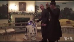 Perezida Barack Obama na Michelle Obama bizihije umunsi wahariwe kuzirikana filimi zitwa “Star Wars” babyina na za robo zo muri izo filimi