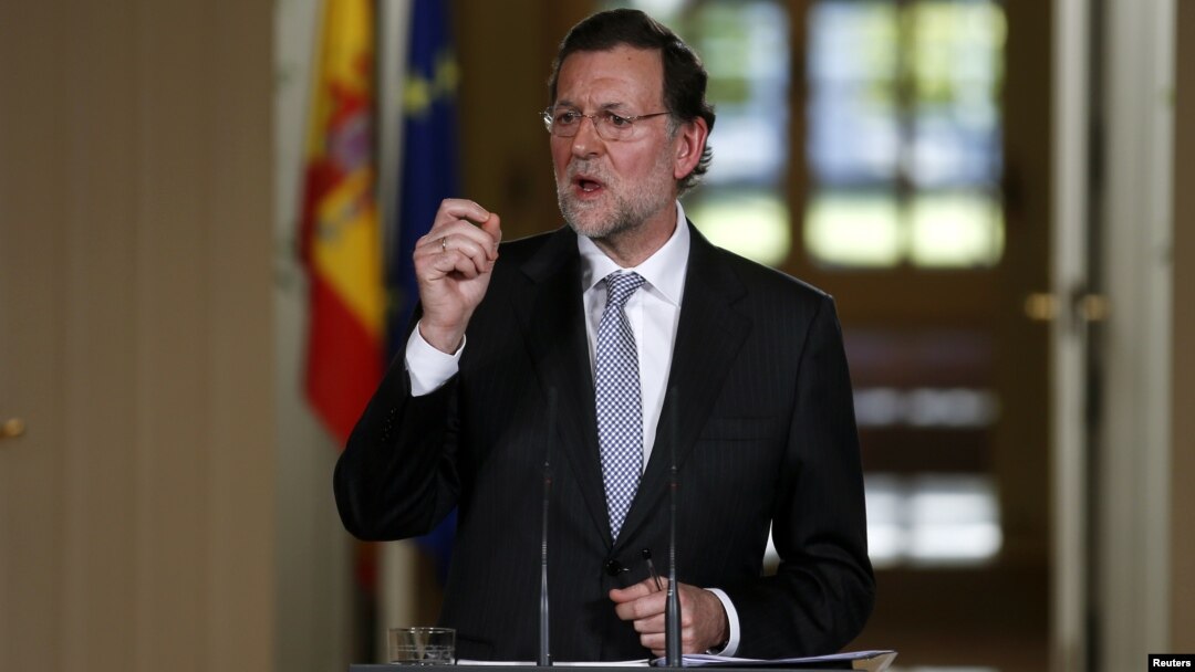 PM Mariano Rajoy berbicara dalam sebuah pertemuan di Madrid Desember 2012. Saat ini ia dituntut mundur atas tuduhan korupsi.