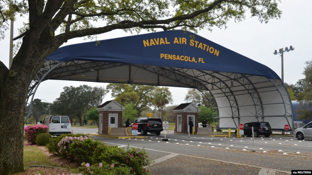 The main gate at Naval Air Station Pensacola is seen on Navy Boulevard in Pensacola, Florida, March 16, 2016.