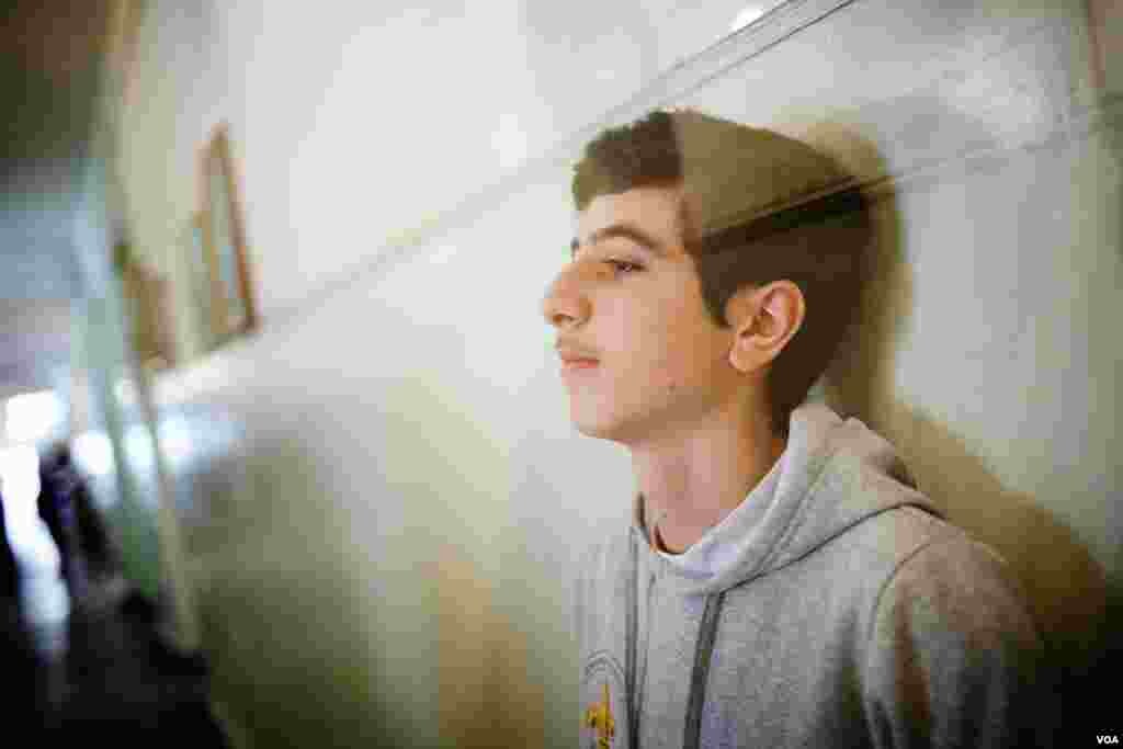 Aren Kurumlian, aged 15, left Aleppo, Syria for a two-week Boy Scout camp in Armenia. Nine months later, he and his family are living in Yerevan, Armenia, February 20, 2013. (V. Undritz/VOA)