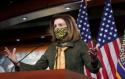 FILE - Speaker of the House Nancy Pelosi speaks during her weekly press conference at the U.S. Capitol, Feb. 18, 2021.