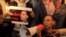 FILE - Maati Monjib, a professor of political history and African studies at the University of Rabat and a writer for national and international news organisations, and his supporters participate in a demonstration near the Moroccan Human Rights Associati