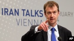 Michael Mann, spokesperson for EU foreign policy chief Catherine Ashton speaks to press during closed-door nuclear talks in Vienna, Austria, Feb. 18, 2014.