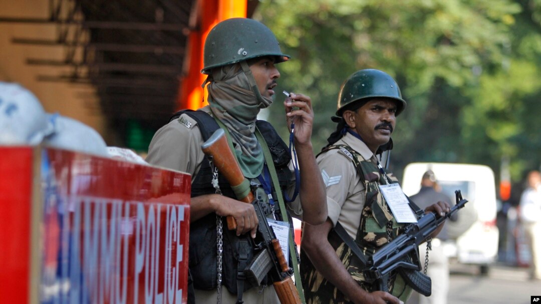 Indian security personnel guard outside the civil secretariat of the Union territory of Jammu and Kashmir during the annual reopening of the former state's winter capital in Jammu, India, Nov. 4, 2019. 