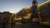 Nuns walk along the Church of the Nativity, traditionally believed to be the birthplace of Jesus, on Christmas Eve, in the West Bank city of Bethlehem, Dec. 24, 2024. 