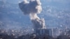 Smoke rises from Beirut southern suburbs after an Israeli strike, amid the ongoing hostilities between Hezbollah and Israeli forces, as seen from Ashrafieh, Lebanon, Nov. 21, 2024.