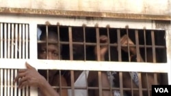 FILE - Prisoners are seen inside a truck before being transported from Kondengui Central Prison, in Yaounde, Cameroon, July 23, 2019. (Moki Edwin Kindzeka/VOA)
