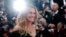 FILE - Cast member Julia Roberts poses on the red carpet as she arrives for the screening of the film "Money Monster" out of competition at the 69th Cannes Film Festival in Cannes, France, May 12, 2016. 