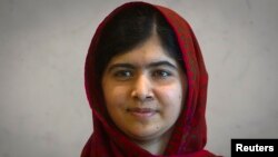 FILE - Pakistani schoolgirl and activist Malala Yousafzai at the United Nations, New York, Aug. 18, 2014.