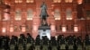 Law enforcement officers stand guard in front of a monument to Soviet Marshal Georgy Zhukov outside Red Square in Moscow, Russia on Feb. 2, 2021.