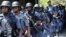 Riot police patrol the campus ahead of student protests demanding free education at Johannesburg's University of the Witwatersrand, South Africa, October 11,2016.