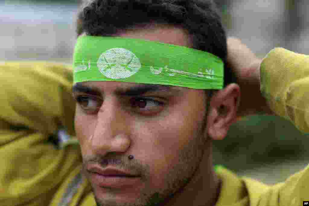 A supporter of ousted President Mohamed Morsi joins in a protest at the Republican Guard building in Nasr City, Cairo, July 10, 2013. 