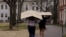 FILE - Students carry boxes to their dorms at Harvard University, after the school asked its students not to return to campus after Spring Break, March 10, 2020, in Cambridge, Massachusetts, U.S.  