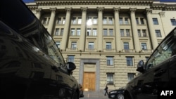 A woman passes by the headquarters of Russia's Rossiya Bank in St. Petersburg, April 4, 2016.