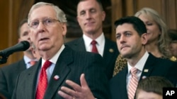 Senate Majority Leader Mitch McConnell speaks on Capitol in Washington, Thursday, Dec. 8, 2016. From left are, McConnell, Rep. Tim Murphy, House Speaker Paul Ryan, and Max Schill, 7, who suffers from Noonan Syndrome.