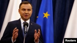 Poland's President Andrzej Duda speaks at the Presidential Palace in Warsaw, Poland, Dec. 28, 2015. 