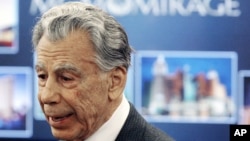 FILE - Kirk Kerkorian, speaks to reporters at the Nevada Gaming Control Board hearing in Las Vegas, Feb. 22, 2005.