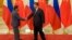 Chinese President Xi Jinping (R) shakes hands with Philippines President Rodrigo Duterte prior to their bilateral meeting during the Belt and Road Forum, at the Great Hall of the People in Beijing, China, May 15, 2017