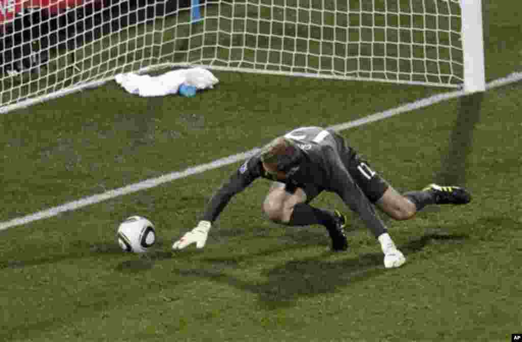 England's Robert Green fails to save a shot by United States' Clint Dempsey during the World Cup group C soccer match between England and the United States at Royal Bafokeng Stadium in Rustenburg, South Africa, on Saturday, June 12, 2010. (AP Photo/Micha