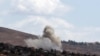 Smoke billows from the site of an Israeli airstrike that targeted an area in the southern Lebanese village of al-Taybeh on Sept. 19, 2024. 