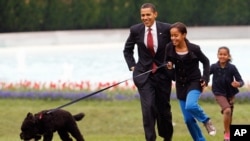 Barack Obama, Sasha Obama dan Malia Obama (Foto: dok).