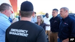 Sen. Marsha Blackburn, R-Tenn, center, TEMA Director Patrick Sheehan, 2nd from right, and Gov. Bill Lee visit the East Tennessee Disaster Relief Center, Hurricane Helene disaster response in Bristol, Tennessee, Oct. 7, 2024.