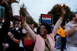 Supporters celebrate the victory of President-elect Democrat Joe Biden, Nov. 7, 2020, in Atlanta.