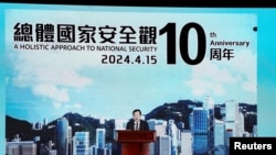 中国的中央港澳办主任夏宝龙2024年4月15日在香港“全民国家安全教育日”开幕活动中通过视频发表谈话。（路透社）