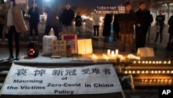 Demonstrators gather at Freedom Plaza in Washington, Dec. 4, 2022, to protest in solidarity with the ongoing protests against the Chinese government's continued zero-COVID policies.