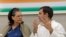 FILE - Rahul Gandhi, then the president of the Congress party, speaks with his mother, Sonia Gandhi, during a party committee meeting in New Delhi, India, May 25, 2019. 