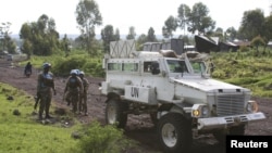 FILE - South African peacekeepers patrol the streets of Goma in the eastern portion of the Democratic Republic of the Congo, Dec. 2, 2015.