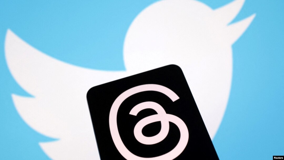 Illustration shows Meta's Threads app and Twitter logos