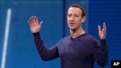 Facebook CEO Mark Zuckerberg delivers the keynote address at a Facebook developers conference in San Jose, California, May 1, 2018. Zuckerberg has come under fire from some groups for saying that Holocaust denial should not be banned on the social media platform.