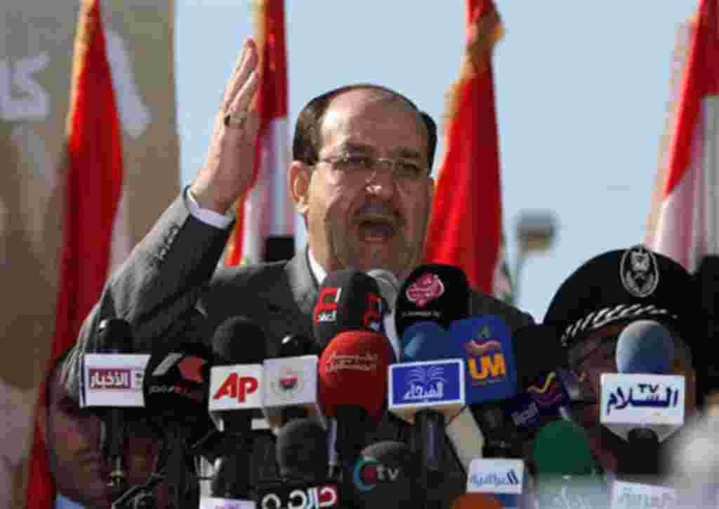 Iraq's Prime Minister Nouri al-Maliki speaks at a parade marking Police Day in Baghdad, 09 Jan 2010