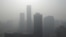 Buildings are seen in heavy haze in Beijing's central business district, January 14, 2013. 