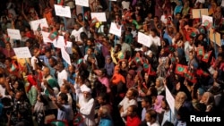 Opposition supporters protest against the government's delay in releasing their jailed leaders, including former president Mohamed Nasheed, despite a Supreme Court order, in Male, Maldives, Feb. 4, 2018.