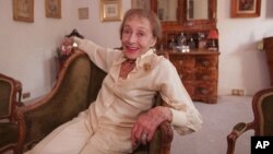 FILE - Actress Luise Rainer poses in her central London apartment, July 29, 1999.