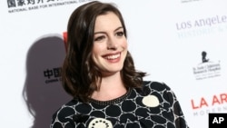Anne Hathaway attends The LA Art Show and The LA Fine Art Show Opening Night Premiere Party held at the LA Convention Center on Jan. 27, 2016, in Los Angeles.