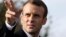 French President Emmanuel Macron arrives at the Trottoir necropolis in Les Eparges, eastern France, Nov. 6, 2018, as part of the ceremonies marking the centenary of the end of World War I. 