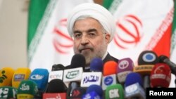 Iranian President-elect Hassan Rohani speaks with the media during a news conference in Tehran, June 17, 2013. 