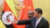 Le président ougandais Yoweri Museveni, avec son homologue chinois Xi Jinping à Pékin, en Chine, le 31 mars 2015. (AP Photo/Feng Li, Pool)