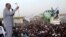 President Omar Hassan al-Bashir addresses a crowd in North Khartoum, Jun. 8, 2013.