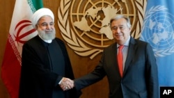 Hassan Rohani, en compagnie du secrétaire général de l'ONU Antonio Guterres, en marge de la 73è Assemblée générale des Nations unies, New York, le 26 septembre 2018. 