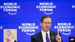 FILE-Israel's President Isaac Herzog speaks at the World Economic Forum in Davos, Switzerland, January 18, 2024.