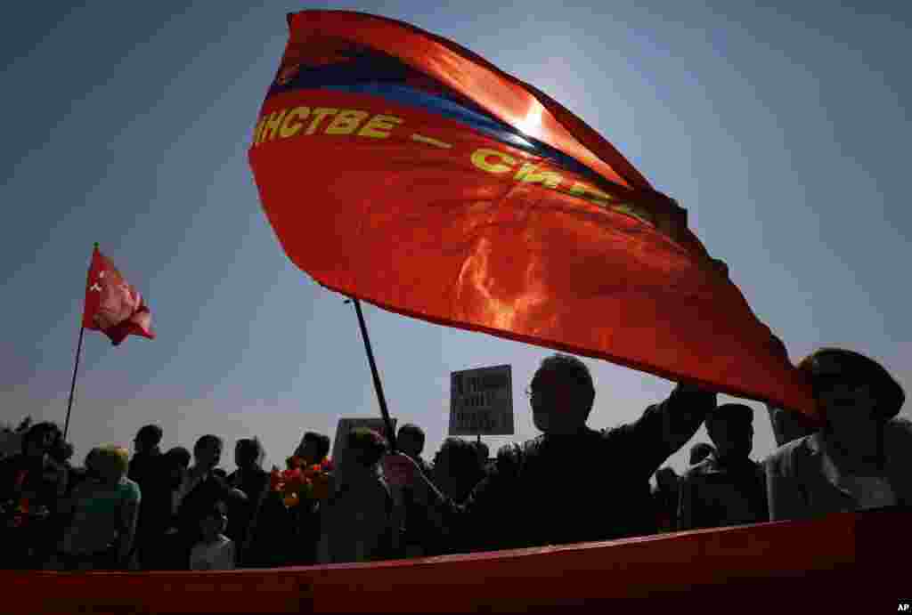 Communists and their supporters celebrate May Day in Kyiv, Ukraine, May 1, 2015.