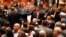 Members of the newly elected Iraqi parliament point fingers at each other after an argument broke out at the parliament headquarters in Baghdad July 1, 2014.