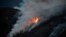 Flames from the Ferguson Fire burn down a hillside in unincorporated Mariposa County Calif., near Yosemite National Park, July 15, 2018.